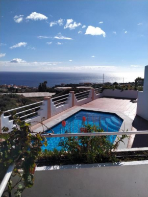 Finca Oasis Mango,Holiday home, Vivienda Vacacional, Candelaria Comunal Pool, Sea View from private terraces,3 mins to town by car, WiFi, Netflix,International TV